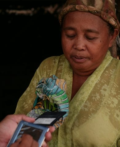 Image of a woman being interviewed.