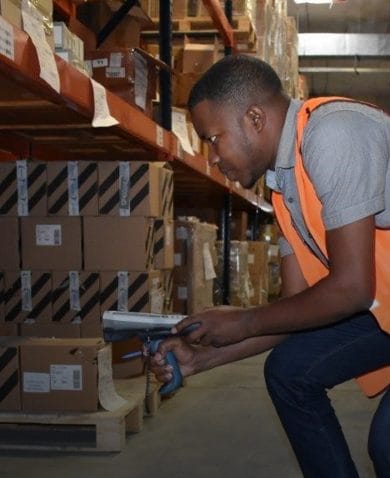 warehouse worker scanning bar codes